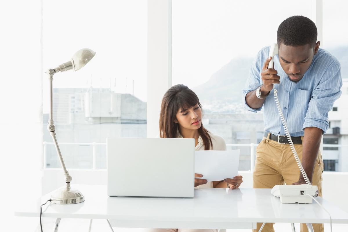 Man and woman working in an office