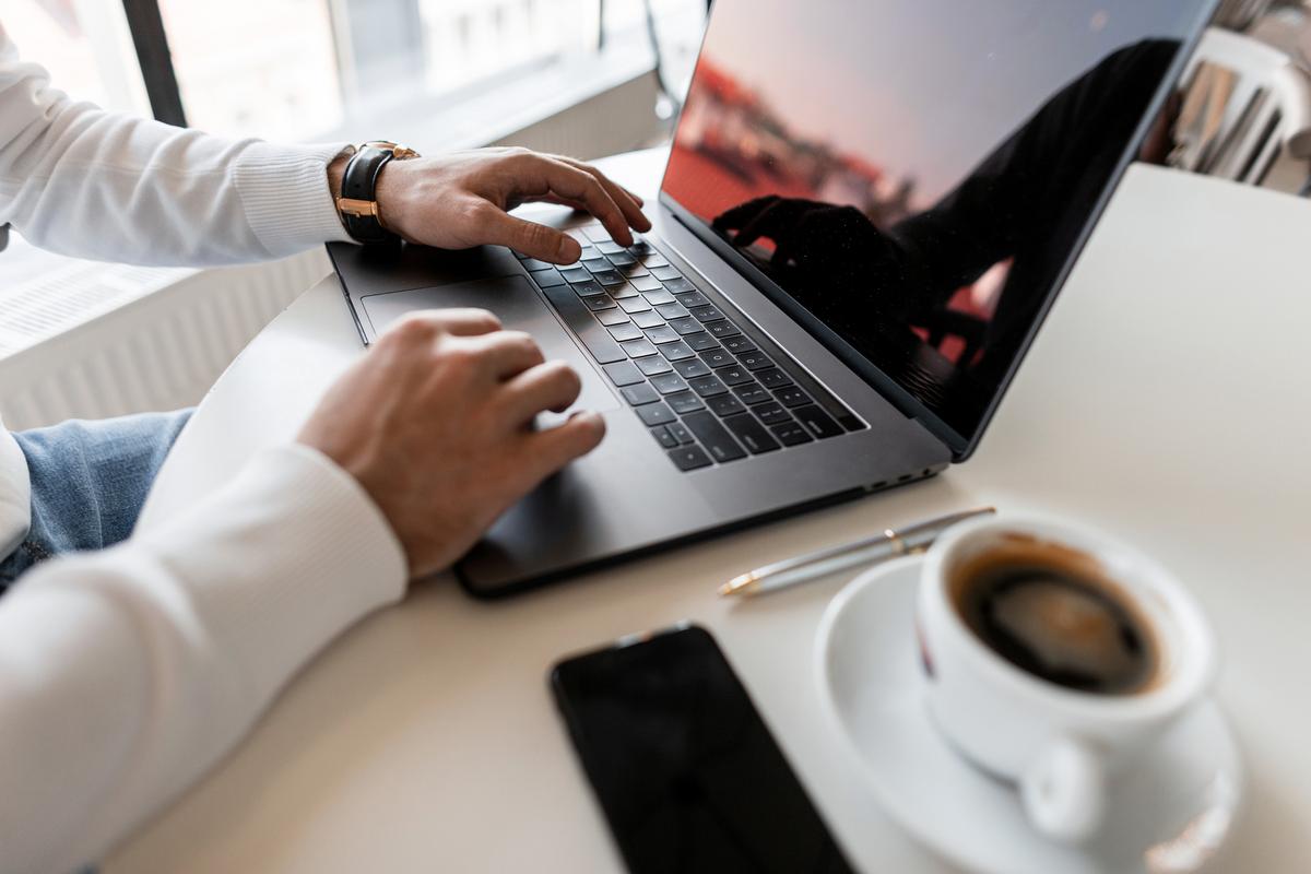 Man using laptop in an office