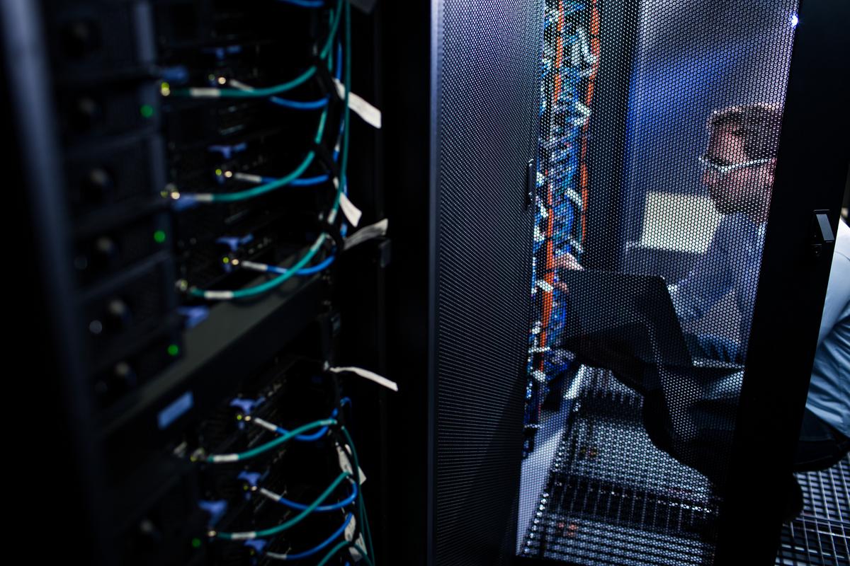 Man working in server room