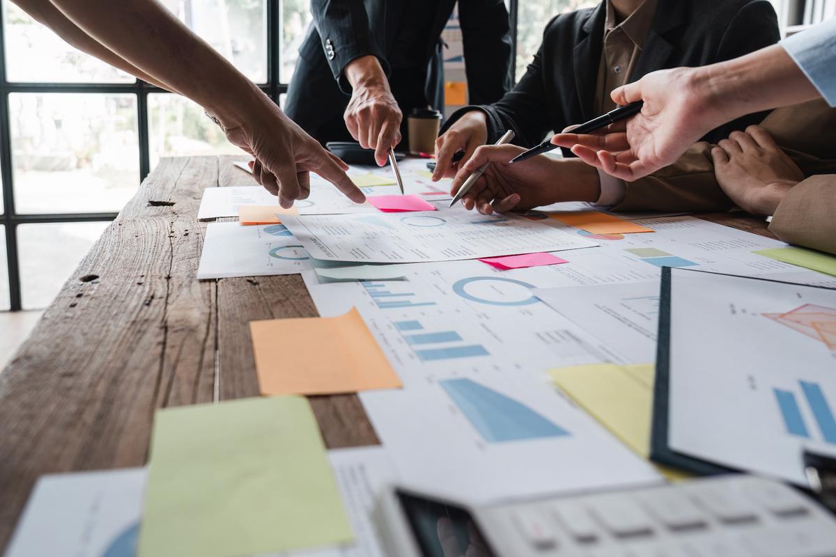 Business desk filled with paper documents