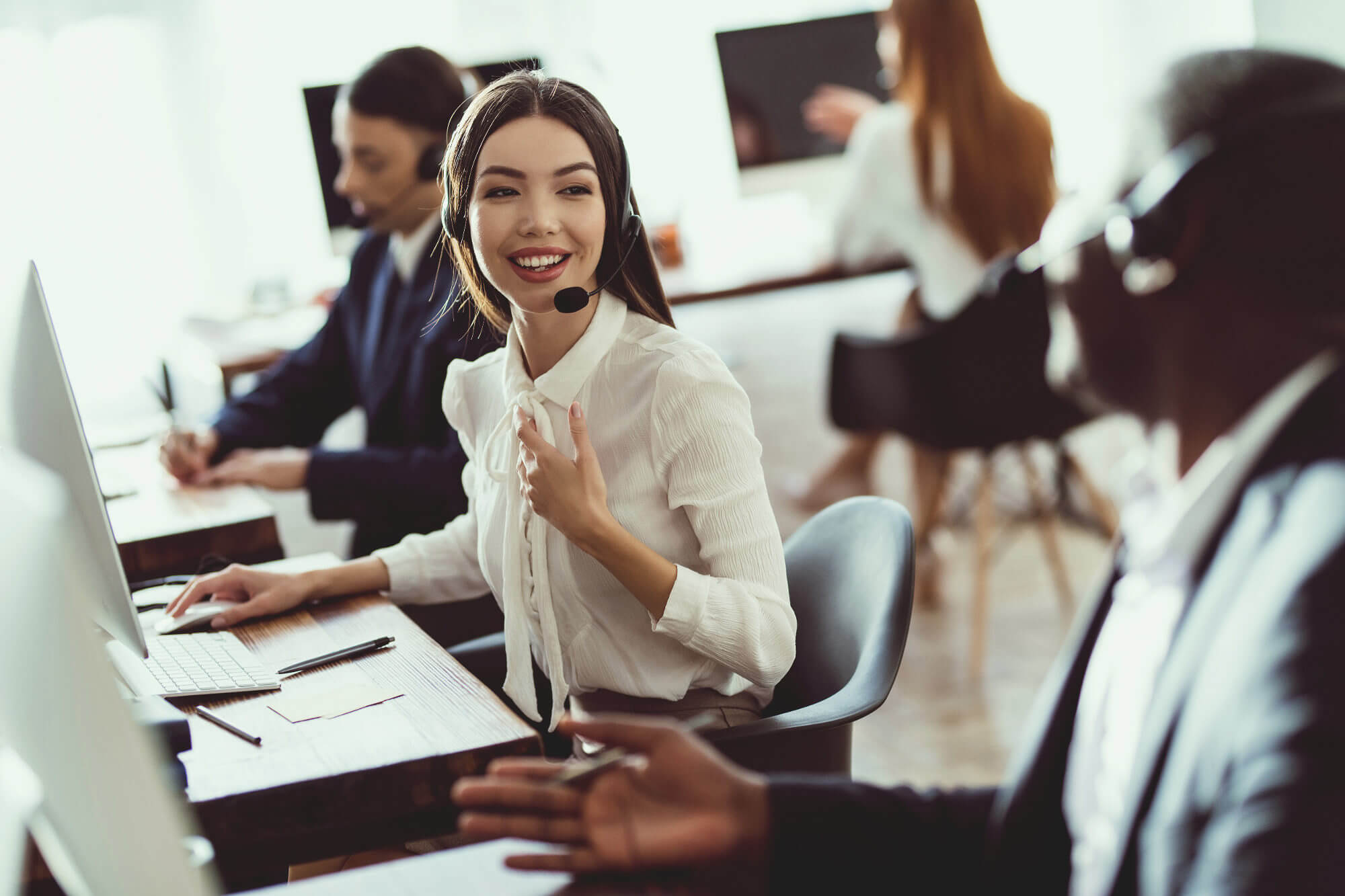 Call center employees conversing