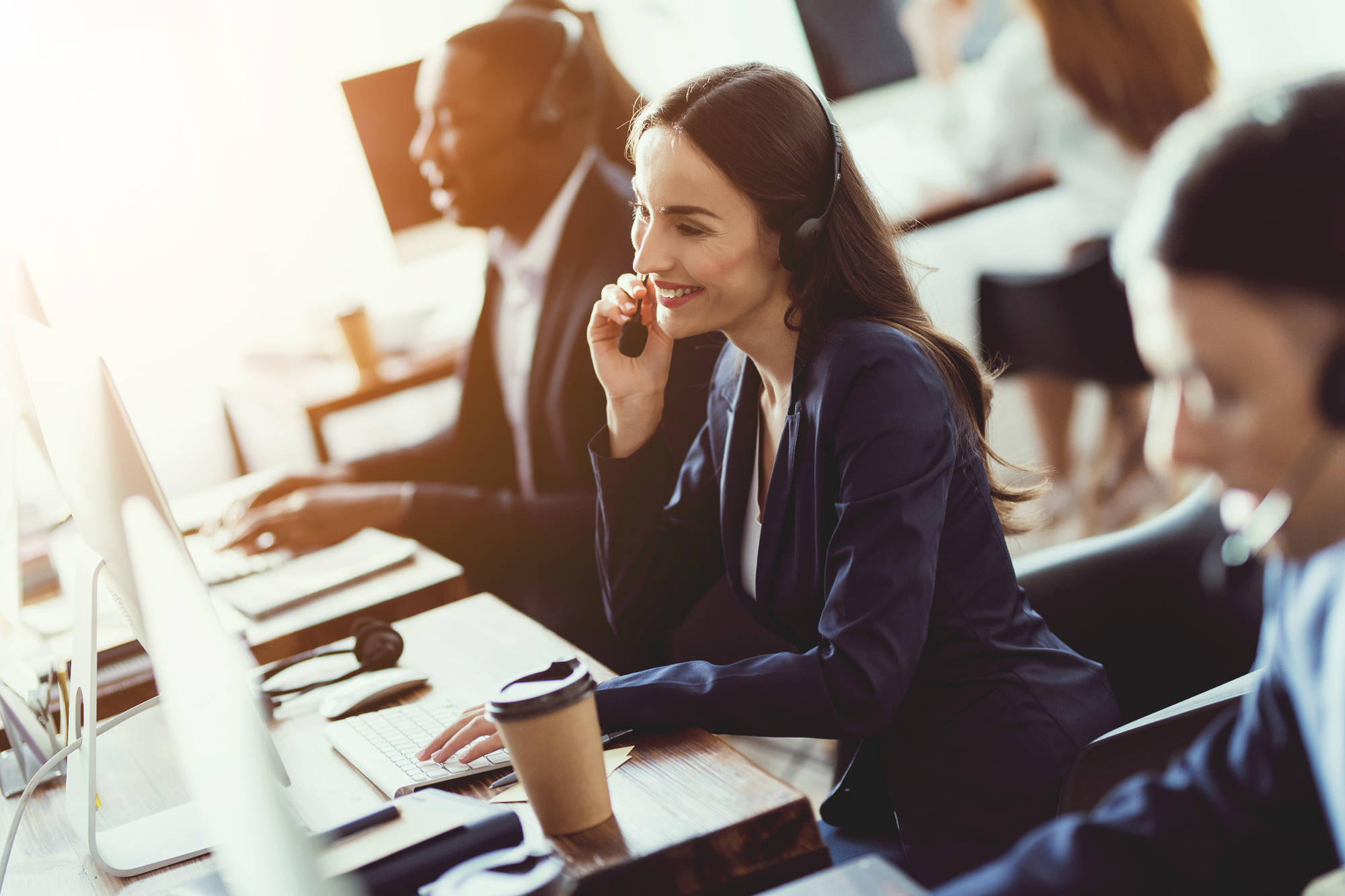 Woman in a call center wearing a VoIP headset